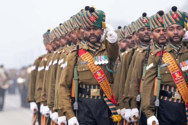 Madras Regiment contingent marches past during a rehearsal for the Republic Day Parade 2024. (Image: PTI)