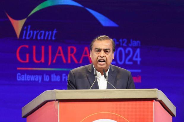 RIL chairman Mukesh Ambani said Reliance invested more than $150 billion, or Rs 12 lakh crore, in creating world-class assets and capacities across India in the past 10 years. He further said that of this investment, more than a third has been invested in Gujarat. (Image/Reuters)
