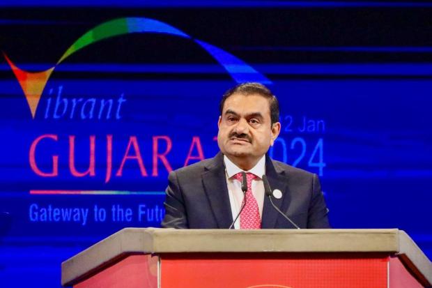 Speaking at the Vibrant Gujarat Global Summit, Adani Group chairperson Gautam Adani announced a Rs 2 lakh crore investment in Gujarat, focused primarily on the development of a green energy park, which, he said, would be visible from space. Adani added that the investment would generate around 1 lakh jobs. (Image/PTI)