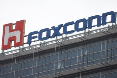 The logo of Foxconn is pictured on top of a company's building in Taipei, Taiwan (Image/Reuters)