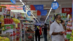 Customers buy grocery items inside a superstore of Reliance Industries Ltd, in Mumbai (Image/Reuters)