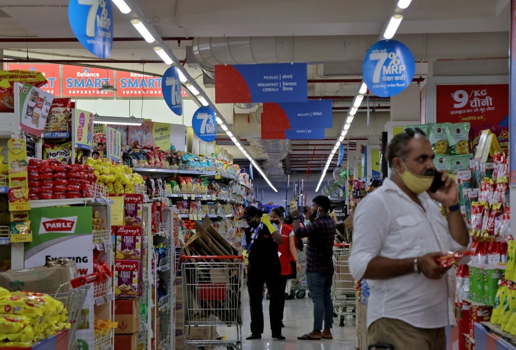 Customers buy grocery items inside a superstore of Reliance Industries Ltd, in Mumbai (Image/Reuters)
