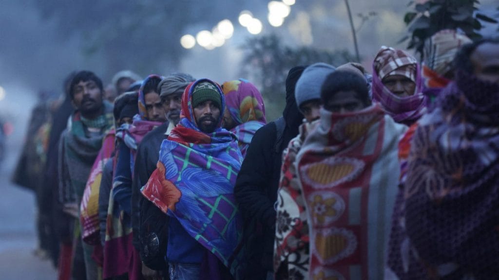 Men wrapped in shawls on a cold winter morning in the old quarters of Delhi (Image/Reuters) Men wrapped in shawls on a cold winter morning in the old quarters of Delhi (Image/Reuters)