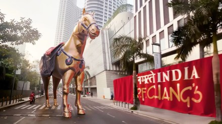 Later, in another video the answer was delivered with the standing guard appearing once again at The One World Place, Lower Parel revealing the P.F. Chang’s restaurant