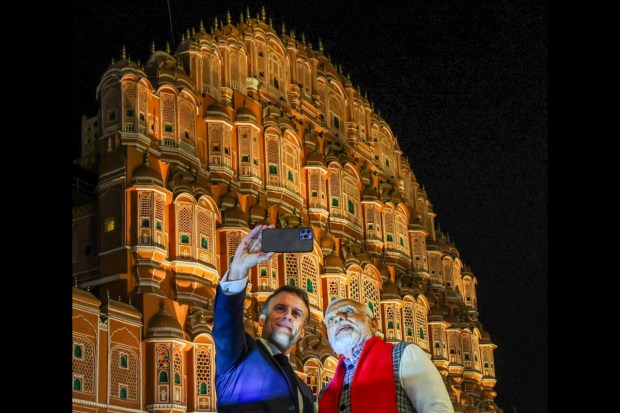 Macron taking selfie with Prime Minister Narendra Modi with the famous Hawa Mahal in the background. (Image: PTI)