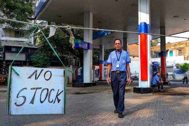 A notice board at a petrol pump reads No Stock amid protests by truck drivers in many parts of the country, in Nagpur. (PTI Photo)