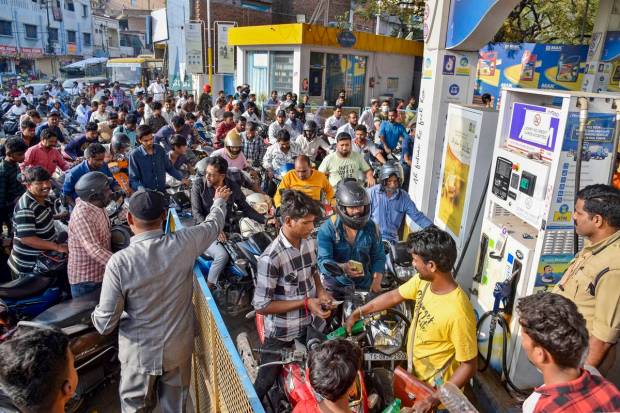 Heavy rush at a petrol pump following nationwide strike of truck drivers over new provisions regarding hit-and-run cases under Bharatiya Nyaya Sanhita, in Hyderabad. (PTI Photo)