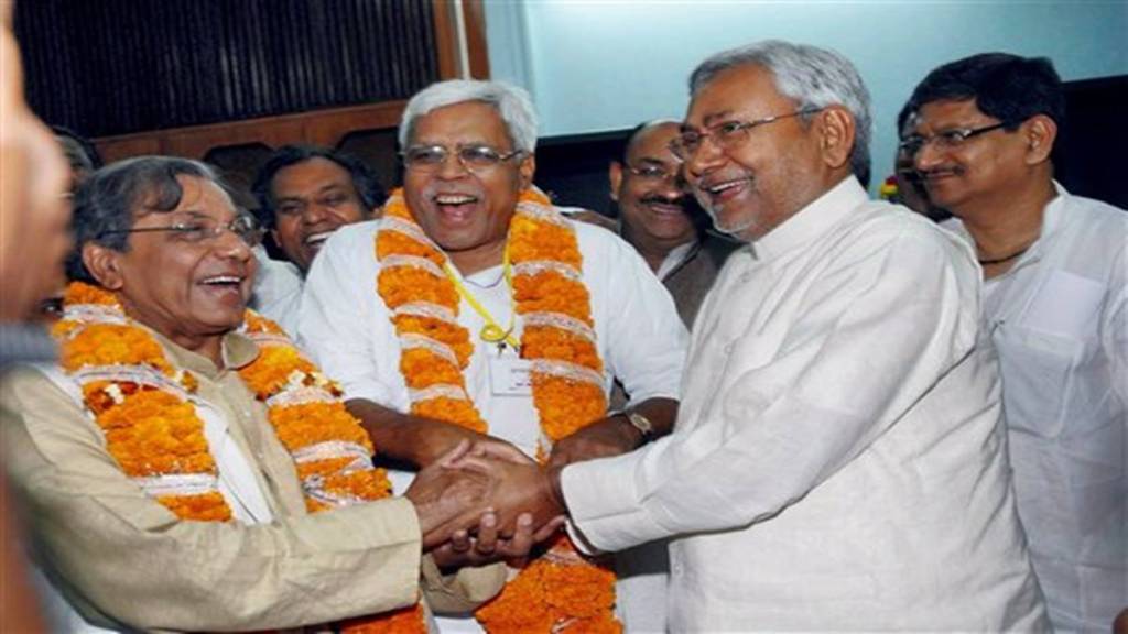 Bihar Chief Minister Nitish Kumar with NK Singh (L) and Shivanand Tiwari (centre) in the Bihar Assembly. (File Photo: PTI/Express Archives) 