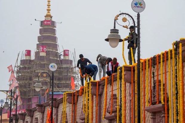 The Ram Mandir being decorated ahead of its consecration ceremony in Ayodhya. (PTI Photo/Arun Sharma) 