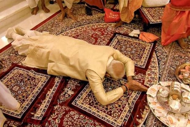 Prime Minister Narendra Modi prostrates before the idol of Ram Lalla during the 'Pran Pratishtha' rituals at the Ram Mandir, in Ayodhya. (PTI Photo)