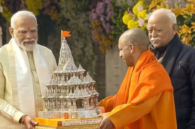 Prime Minister Narendra Modi being presented a replica of Ayodhya's Ram Mandir by Uttar Pradesh Chief Minister Yogi Adityanath after the 'Pran Pratishtha' ceremony at the Ram Mandir, in Ayodhya, Monday, Jan. 22, 2024. (PTI Photo)