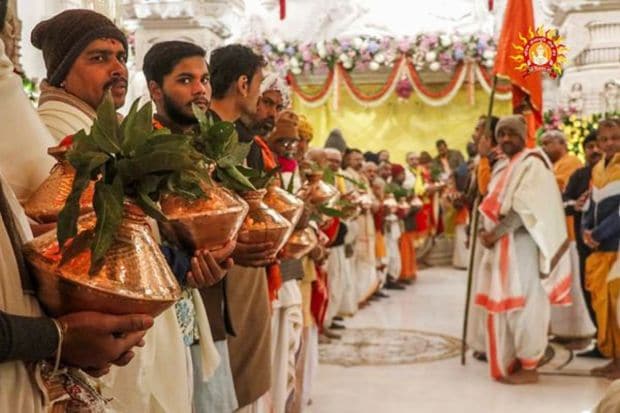 Folk artists perform near Hanuman Garhi Temple as part of security arrangements for the consecration ceremony at the newly constructed Ram Mandir, in Ayodhya. (PTI Photo/Arun Sharma)