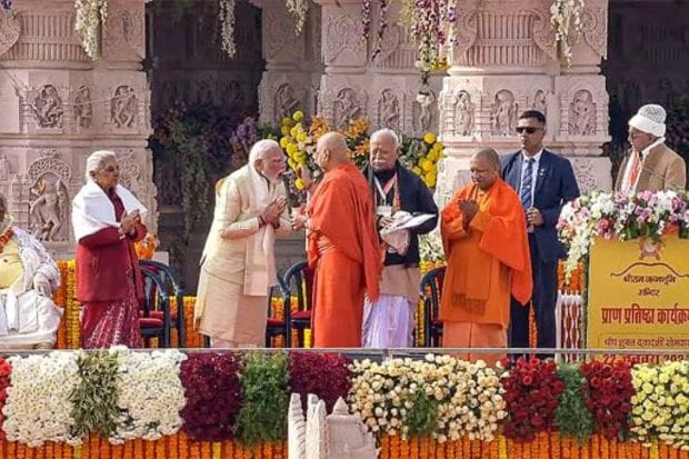 Prime Minister Narendra Modi breaks his fast after the ‘Pran Pratishtha’ ceremony at the Ram Mandir, in Ayodhya, Monday, Jan. 22, 2024. Swami Govind Dev Giriji Maharaj, a member of the Shri Ram Janmabhoomi Teertha Kshetra trust, Uttar Pradesh Chief Minister Yogi Adityanath and RSS Chief Mohan Bhagwat are also seen. (PTI Photo)
