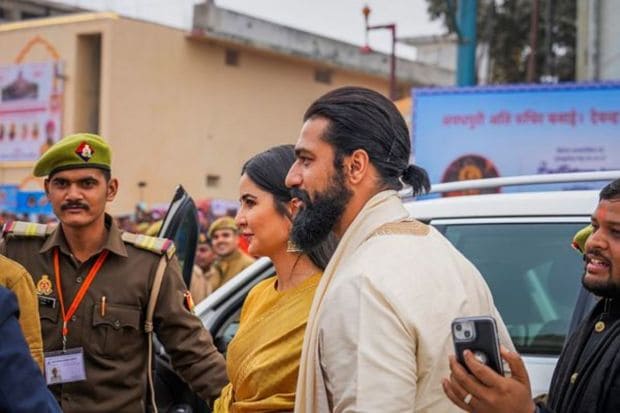 Actors Vicky Kaushal and Katrina Kaif arrive for the consecration ceremony at the Ram Mandir, in Ayodhya. (PTI Photo/Kamal Kishore)