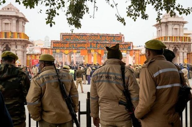 Security personnel deployed near the Ram Mandir premises as part of security arrangements for the consecration ceremony. (PTI Photo/Kamal Kishore)