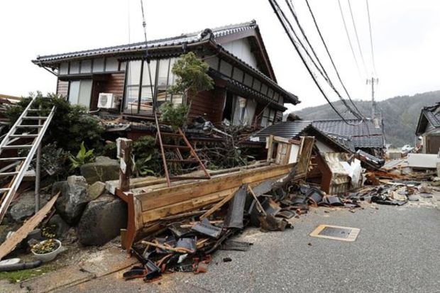 Damaged houses sit following an earthquake in Wajima, Ishikawa prefecture, Japan Tuesday, Jan. 2, 2024. (Photo: AP)