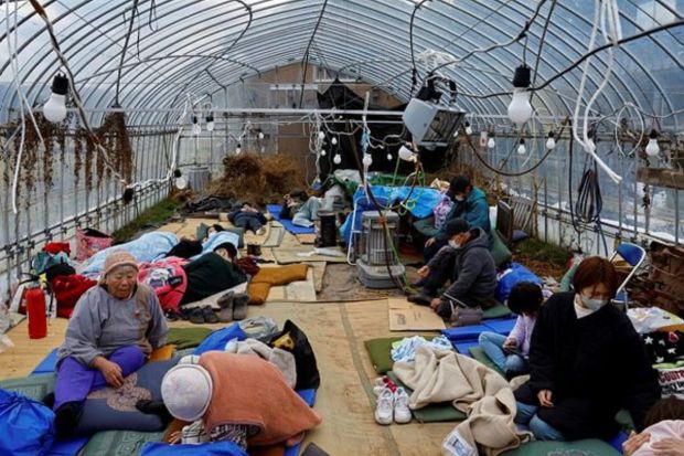 Evacuated people rest at a green house converted as an evacuation center, in the aftermath of an earthquake, in Wajima, Ishikawa prefecture, Japan January 2, 2024. (Photo: Reuters)