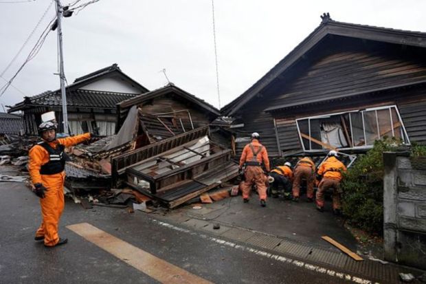 Rescue workers search a collapsed house caused by powerful earthquake in Suzu, Ishikawa Prefecture Wednesday, Jan. 3, 2024. (Photo: AP)