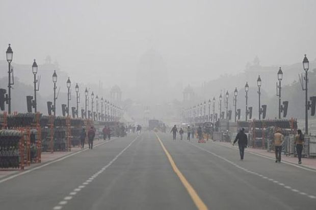 Preparations in full swing for the upcoming Republic Day parade at Kartavya Path amid fog on a cold winter morning, in New Delhi, Saturday. (PTI Photo)