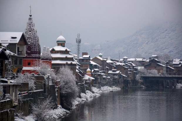 Jammu & Kashmir: Srinagar’s Jhelum river covered in snow (PTI Photo)