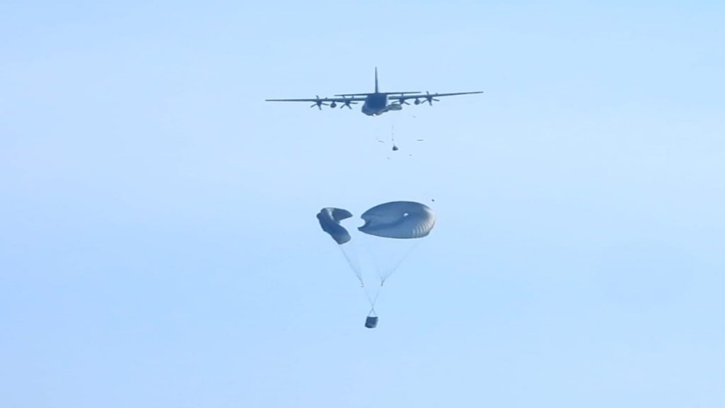 The Indian Navy conducting airborne insertions of Special Forces by paradropping inflatable crafts and MARCOs from C-130 aircraft into the Arabian Sea. (Image: Indian Navy)
