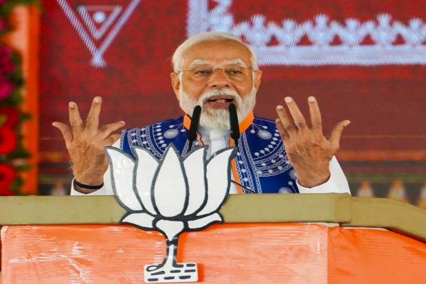 Prime Minister Narendra Modi addresses the 'Janjatiya Sammelan' in Jhabua, Madhya Pradesh. (PTI Photo)