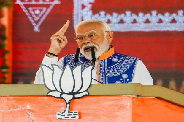 Prime Minister Narendra Modi addresses the 'Janjatiya Sammelan' in Jhabua, Madhya Pradesh. (PTI Photo)