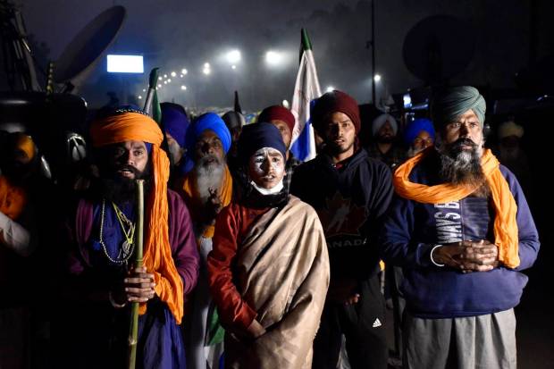 Farmers perform 'Ardas' amid protest at the Shambhu Border during the Samyukta Kisan Morcha's (SKM) Bharat Bandh, in Patiala district. (PTI Photo)
