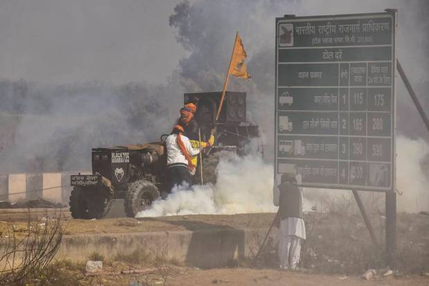 Tear gas being fired upon the protesting farmers at the Shambhu Border during the Samyukta Kisan Morcha's (SKM) Bharat Bandh, in Patiala district. (PTI Photo)