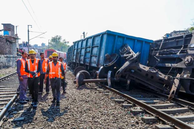 Restoration work underway after a goods train derailed near Zakhira in New Delhi. (PTI Photo)