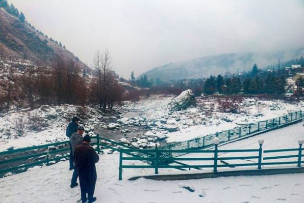 Roads and vehicles covered in snow after fresh snowfall at Atal Tunnel, in Manali. (PTI Photo)