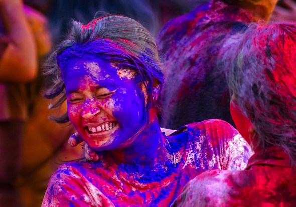 Youngsters play with colours during Holi festival celebrations, in Nagpur (PTI)