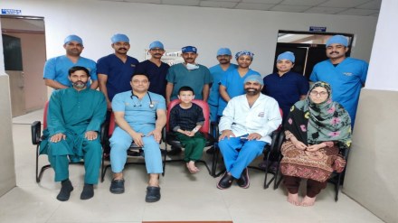 The pediatric cardiology team of the Armed Forces Medical Services (AFMS) with child and his family. (Image: MoD)
