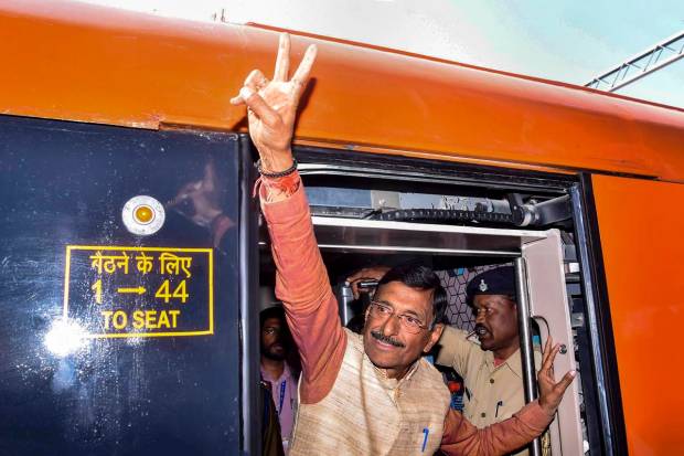 BJP MP Sanjay Seth flashes victory sign during Ranchi-Varanasi Vande Bharat train's flag-off by Prime Minister Narendra Modi via video conferencing from Gujarat's Ahmedabad, at Ranchi Railway Station. (PTI Photo)