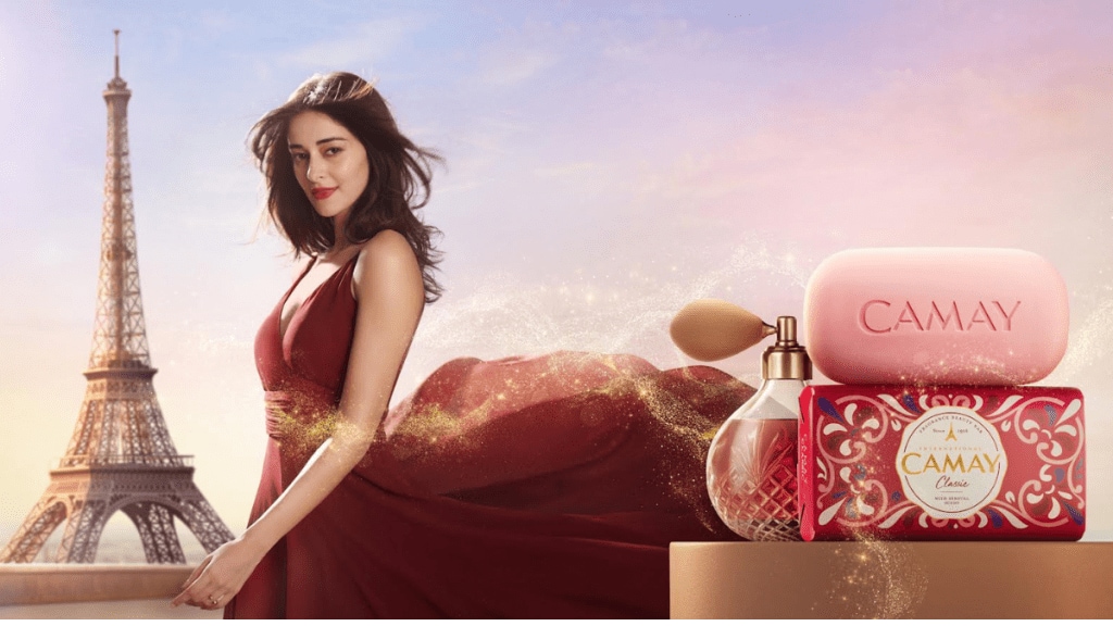 As the story unfolds, she walks the streets of the city, captivating onlookers with the fragrance of French perfume infused in her Camay soap bar