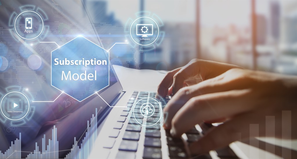 Subscription,Business,Model,Concepts.close-up,Of,Man,Hands,Using,Laptop,Or