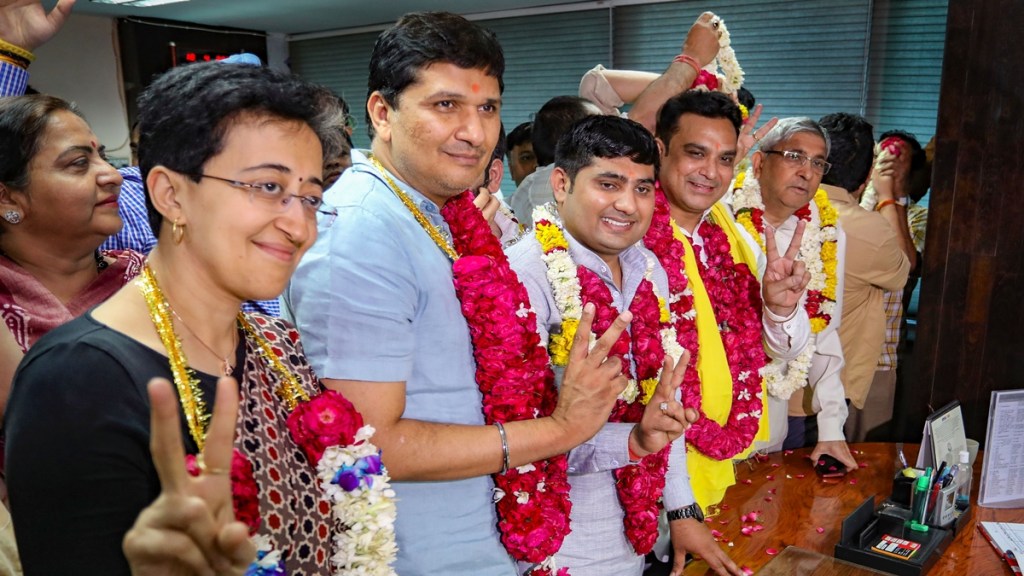 Aam Aadmi Party’s (AAP) Dev Nagar ward councillor Mahesh Khichi and Aman Vihar councillor Ravinder Bhardwaj file their nominations for the post of Mayor and Deputy Mayor respectively at the MCD office, ahead of the Municipal Corporation of Delhi (MCD) mayoral polls, in New Delhi, Thursday, April 18, 2024. Delhi Ministers and AAP leaders Atishi and Saurabh Bharadwaj are also seen. (PTI Photo)