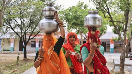 Women voters show their fingers marked with indelible ink after casting votes during the second phase of Lok Sabha elections, in Dudu district, Friday, April 26, 2024. (PTI Photo)