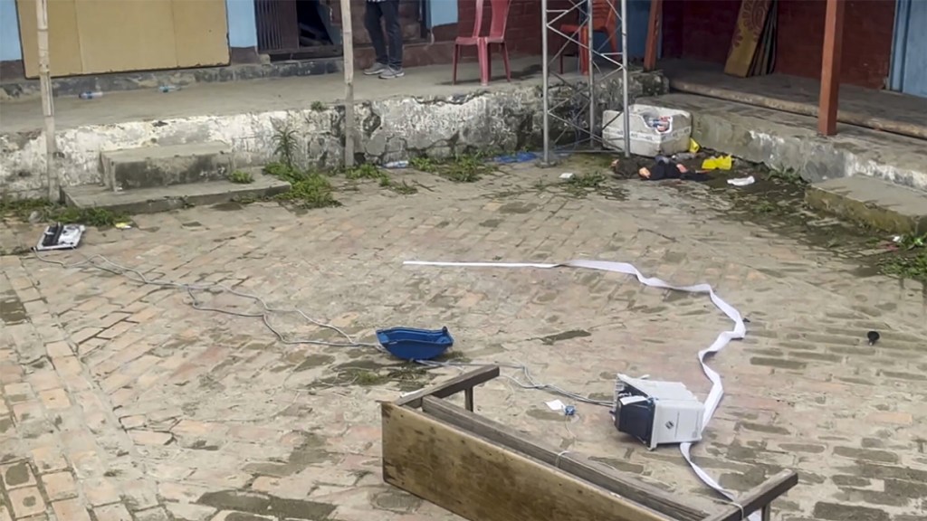 A broken EVM at a polling booth after incidents of clashes during 1st phase of Lok Sabha polls in Manipur. (PTI Photo)