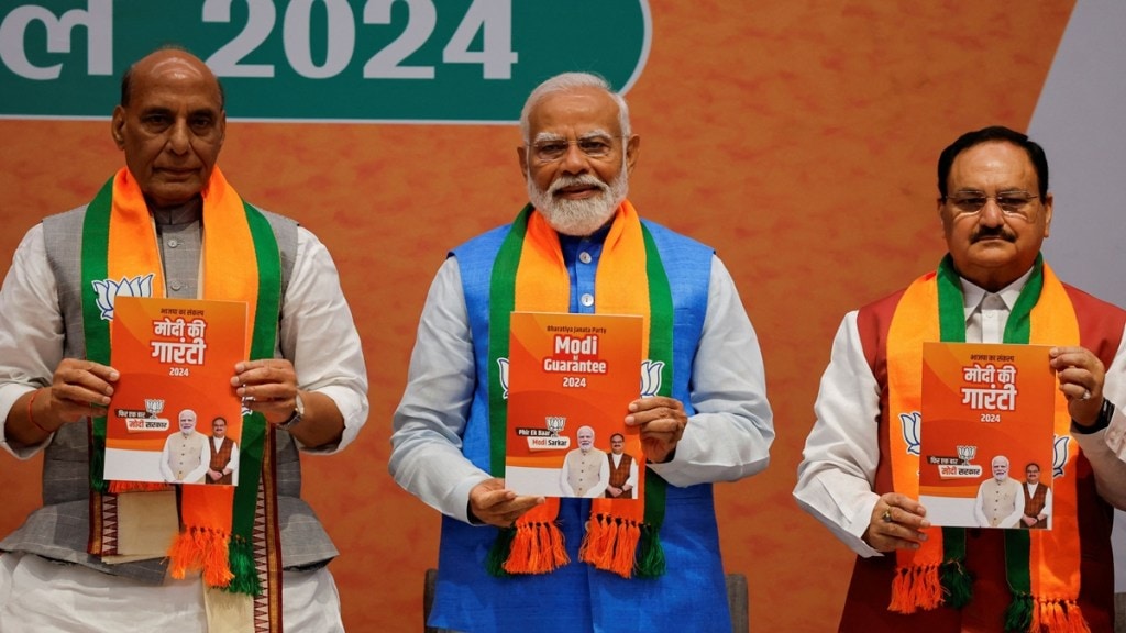 Indian Defence Minister Rajnath Singh, Prime Minister Narendra Modi and President of the Bharatiya Janata Party J. P. Nadda display copies of the ruling Bharatiya Janata Party's (BJP) election manifesto for the general election, in New Delhi, India, April 14, 2024. REUTERS/Adnan Abidi Indian Defence Minister Rajnath Singh, Prime Minister Narendra Modi and President of the Bharatiya Janata Party J. P. Nadda display copies of the ruling Bharatiya Janata Party's (BJP) election manifesto for the general election, in New Delhi, India, April 14, 2024. REUTERS/Adnan Abidi
