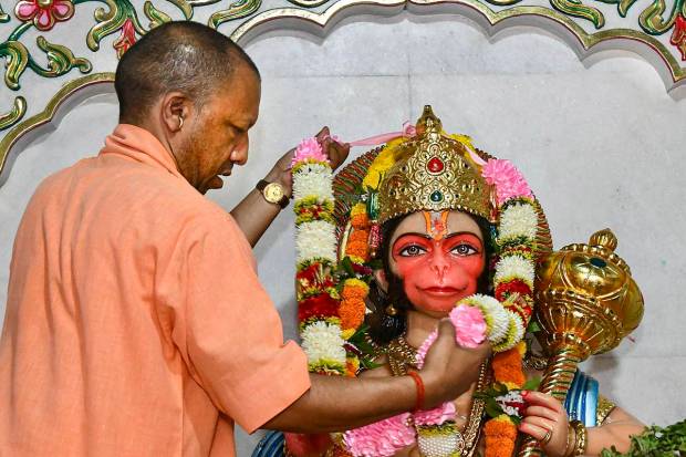 Uttar Pradesh Chief Minister Yogi Adityanath offers prayers on the occasion of 'Hanuman Jayanti' festival at the Gorakhnath Temple in Gorakhpur. (PTI Photo)
