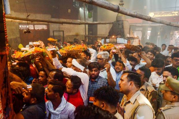 Devotees arrive to offer prayers at a Lord Hanuman temple on the occasion of 'Hanuman Jayanti', in Kanpur. (PTI Photo)