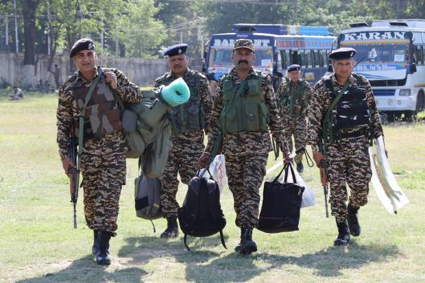 Security personnel leave for election duty ahead of the 2nd phase of voting for Lok Sabha elections, in Jammu. (PTI Photo)