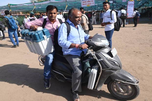 Polling parties leave for election duty on the eve of the 2nd phase of Lok Sabha elections, in Jodhpur. (PTI Photo)