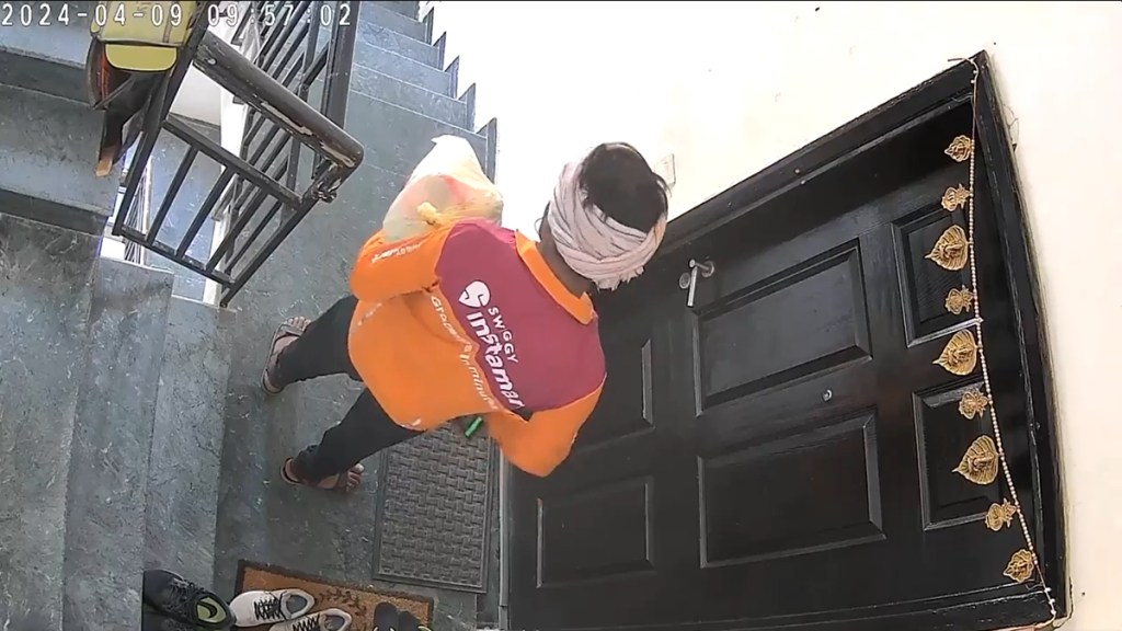 Swiggy delivery agentg steals Nike shoes viral video Swiggy delivery agentg steals Nike shoes viral video