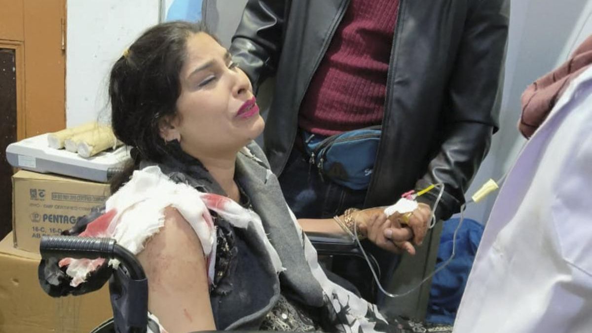 Injured woman being treated for her injuries after terrorists attacked a tourist camp in J&K’s Anantnag district (Photo: PTI)