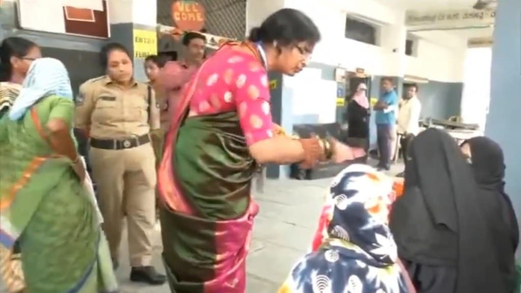 BJP's Madhavi Latha asks burga-clad women to show face for ID check in Hyderabad, booked BJP's Madhavi Latha asks burga-clad women to show face for ID check in Hyderabad, booked