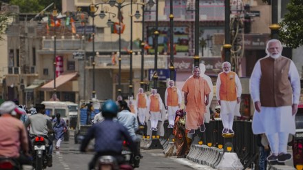 Cutouts of Prime Minister Narendra Modi and Uttar Pradesh Chief Minister Yogi Adityanath are placed on a road ahead of PM Modi’s roadshow for the Lok Sabha elections, in Ayodhya, Sunday, May 5, 2024. (PTI Photo/Arun Sharma) Cutouts of Prime Minister Narendra Modi and Uttar Pradesh Chief Minister Yogi Adityanath are placed on a road ahead of PM Modi’s roadshow for the Lok Sabha elections, in Ayodhya, Sunday, May 5, 2024. (PTI Photo/Arun Sharma)