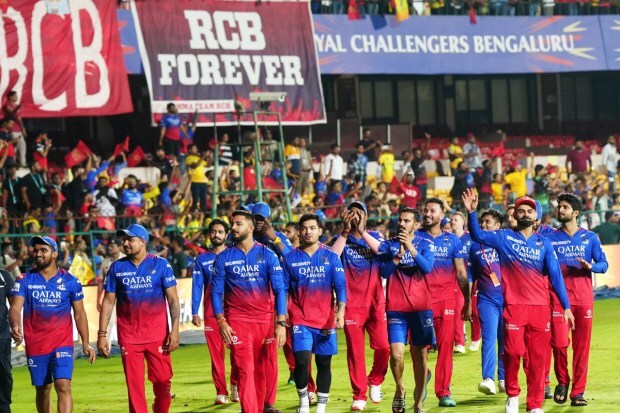 Victory lap at Chinnaswamy Stadium as RCB players acknowledge their fans after qualifying for the playoffs. (PTI Photo)