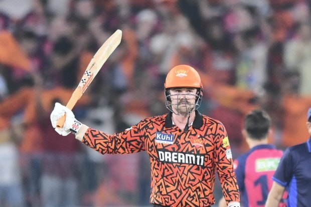 Travis Head holds the record for the fastest hundred, with a stunning knock of 102 runs off 39 balls in a match against RCB at Chinnaswamy Stadium on April 15. (PTI Photo)